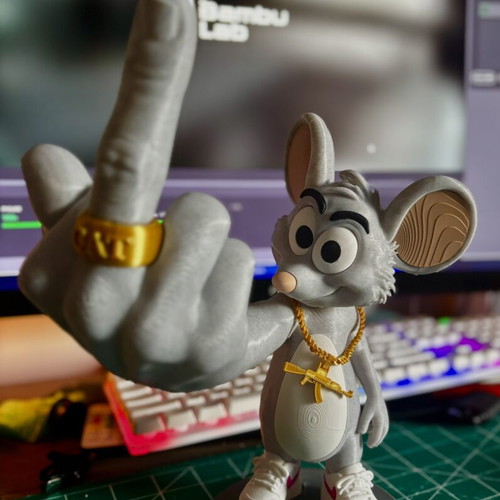 Rat Killah figure with gold CAT ring