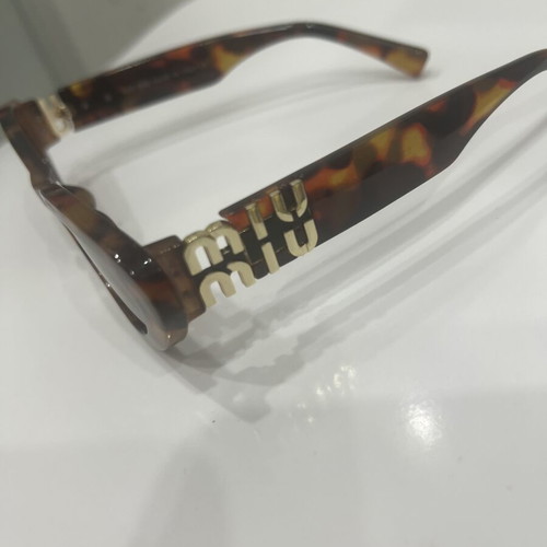 Miu Miu sunglasses like new, brown women's