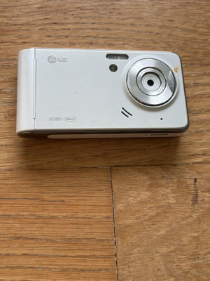 LGKU990i collectible phone like new, white, camera up to 7.9 MPixel