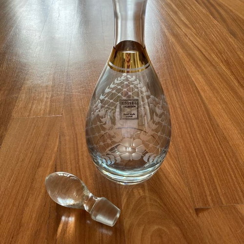 Crystal wine carafe with gold detail and engraved design