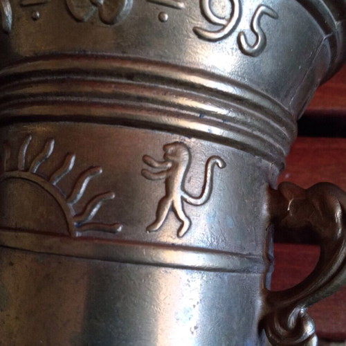 Copper mortar used with embossed decorations