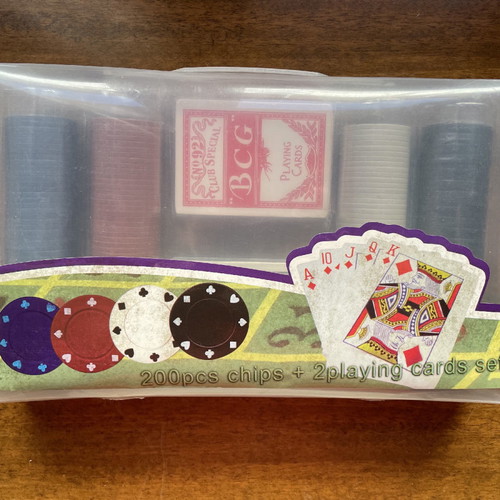 Poker set new with chips and playing cards in plastic case