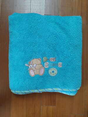 Baby fleece blanket used, blue with appliqué designs
