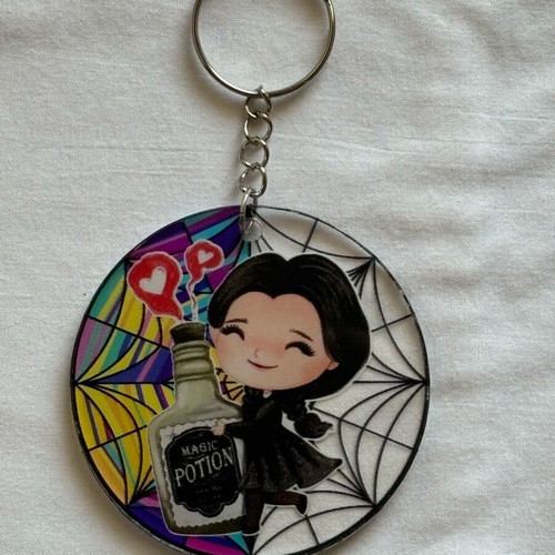 Witch with magic potion keyring like new, multicolor