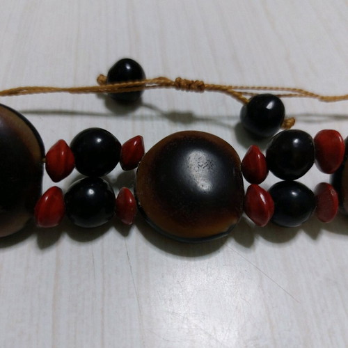 Wooden bracelet like new made from coconut with adjustable cord