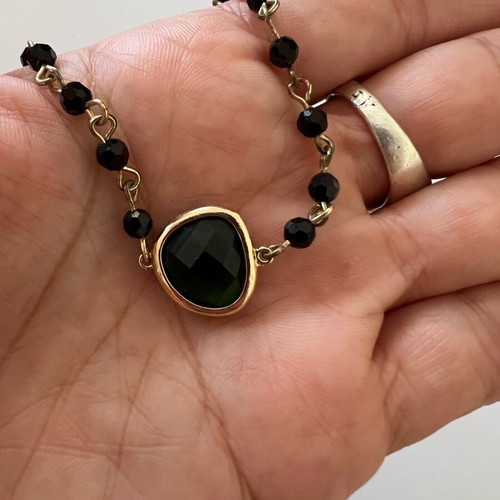 Necklace with steel elements like new, green and gold