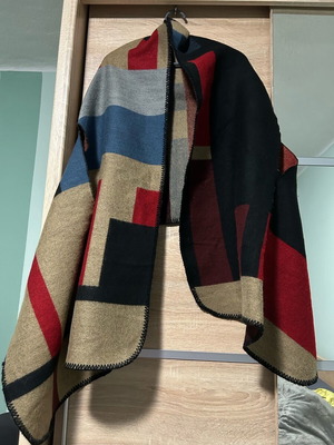 Poncho used, multicolored with hand openings