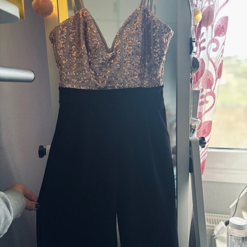 One-piece jumpsuit used, pink sequin top, flared pants, size S-M