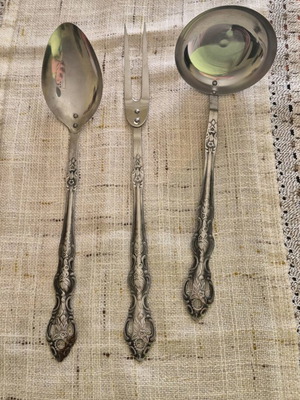 Vintage set two spoons and one fork used