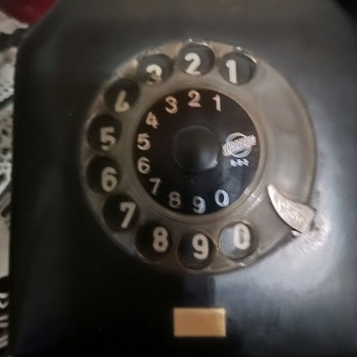Vintage telephone device refurbished, black, wired, made in Germany