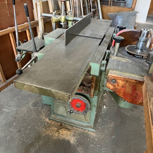 Woodworking machines used, set with bandsaw, planer, press