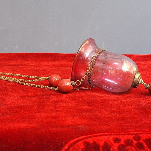 Hanging lamp used, blown red glass with ceramic balls and cross
