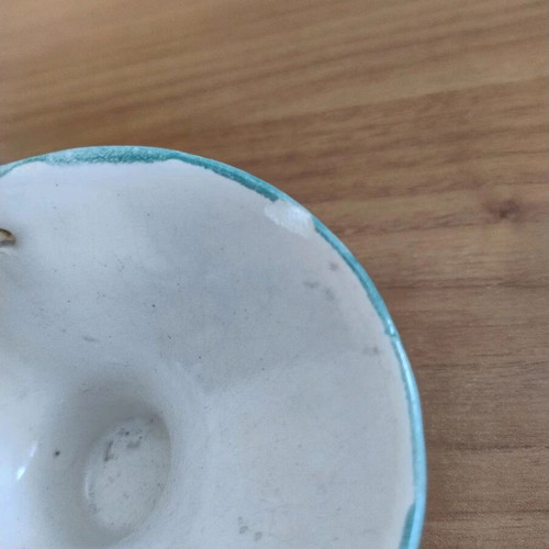 Decorative small ceramic basket used with wear marks