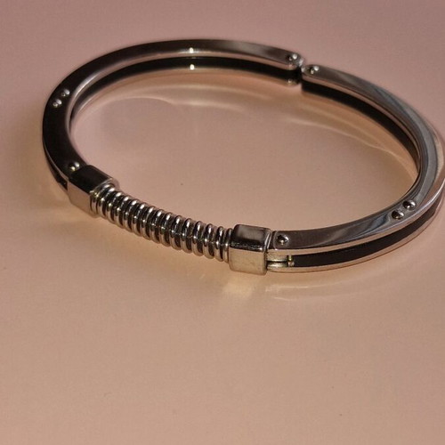 Men's steel handcuff bracelet like new, black and silver