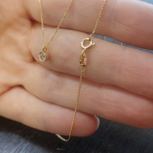 K14 gold pendant like new with zircon stone