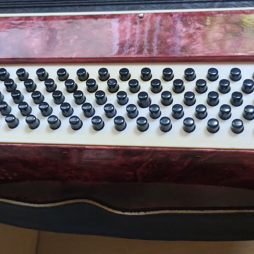 Vostok Accordion like new, red pearl vintage with case and books