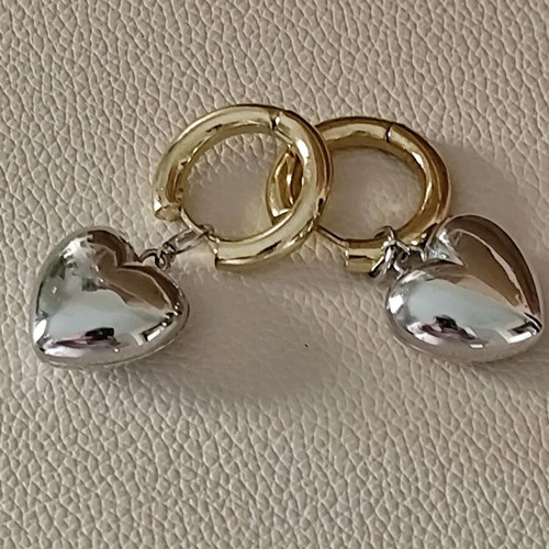 Balenciaga earrings with two tone dangling hearts like new