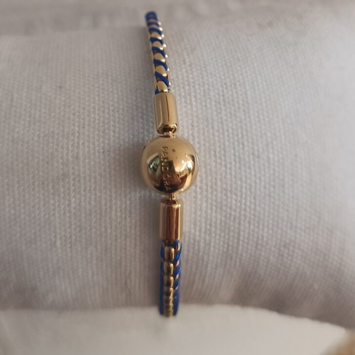 Pandora bracelet like new, silver 925 with gold and blue cord, charm gift