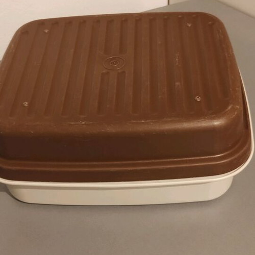 Tupperware two used baking pans combined into one large pan