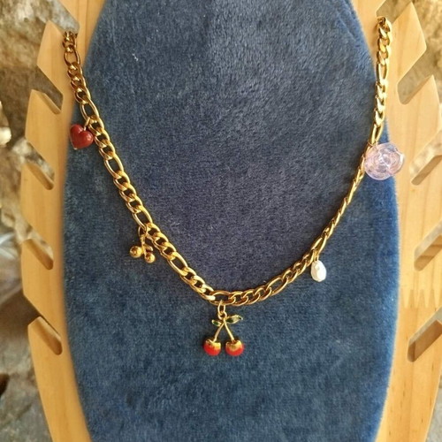Steel necklace new gold color with decorative charms