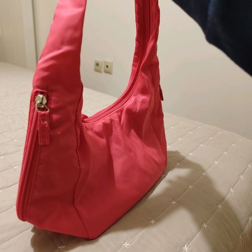 Nylon handbag like new, pink fluo with 3 compartments
