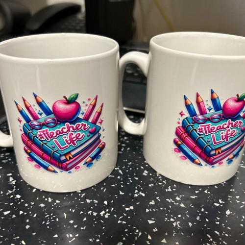 Mugs new with best teacher sticker, set of 2