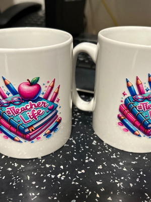 Mugs new with best teacher sticker, set of 2