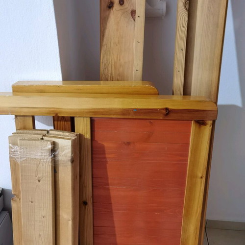 Wooden bed used with slats