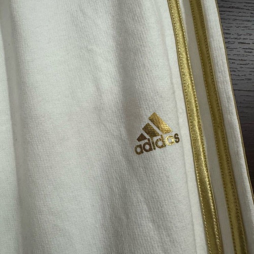 Adidas kids tracksuit new, white with gold stripes, size 14 or Small