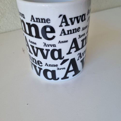 White semi-porcelain mug with the name Anna