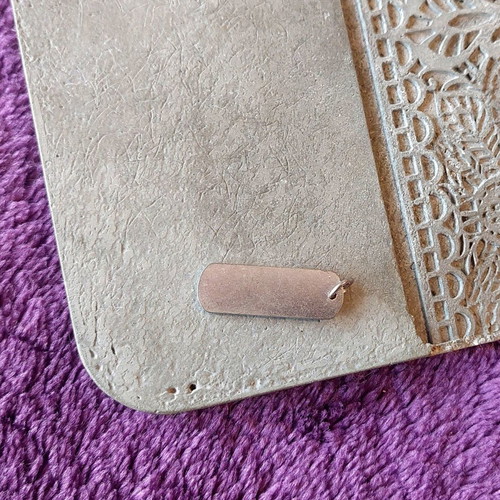 Silver pendant tag with Faith inscription