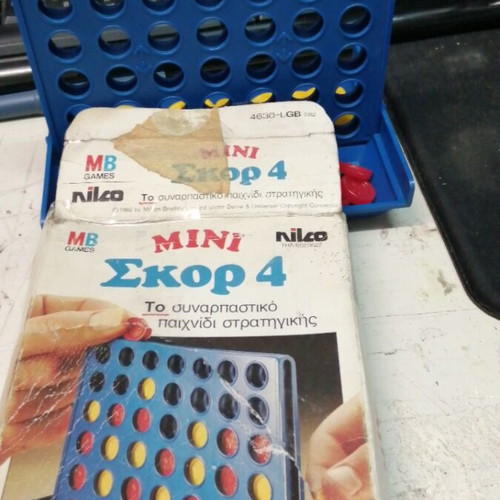Mini Skor 4 board game used by NIKO MB GAMES