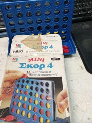 Mini Skor 4 board game used by NIKO MB GAMES