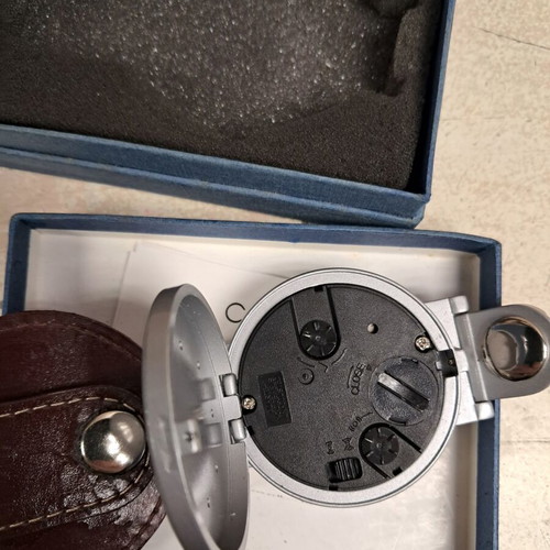 Travel alarm clock like new with leather cover