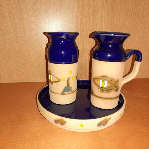Traditional clay jugs with tray like new