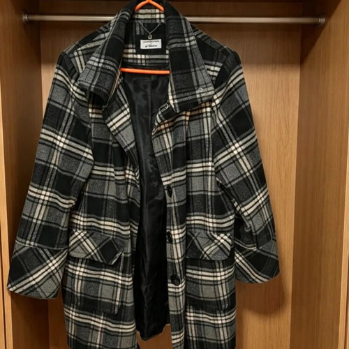 Checked coat with high collar, pockets and buttons