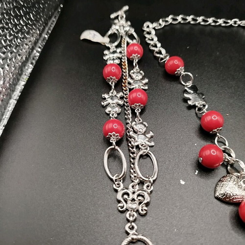 Bracelet and necklace set with red beads and metal charms new