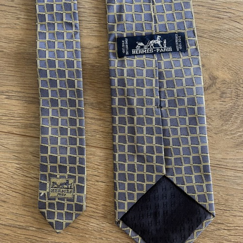 Hermes silk tie like new with geometric basketweave pattern in blue and yellow
