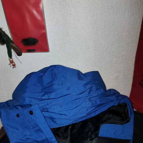 The North Face men's jacket used blue and black waterproof windbreaker