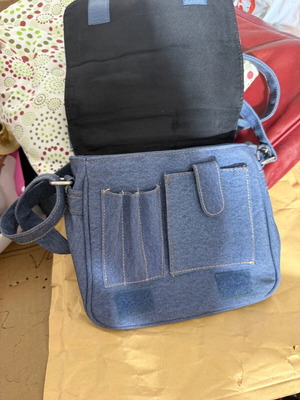 Denim-effect shoulder bag with multiple compartments