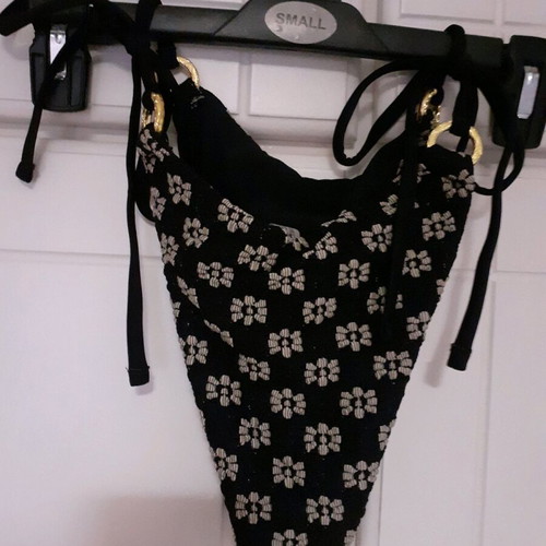 Shein bikini swimsuit used black with white embossed flowers and gold rings