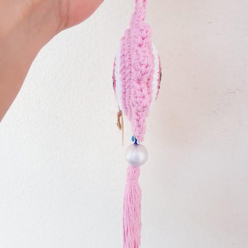 Handmade crochet evil eye in baby pink