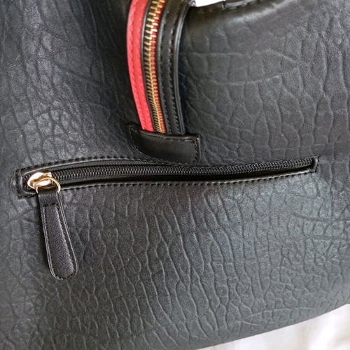 Women's shoulder bag used, black with red details