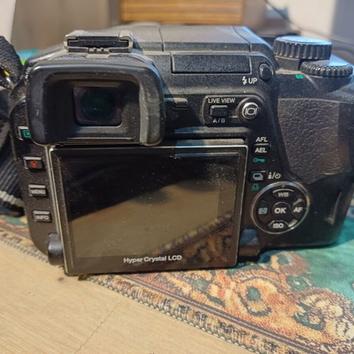 Olympus E-330 DSLR camera used with Zuiko Digital 14-45mm lens