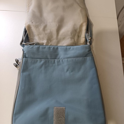 Fabric crossbody bag used, turquoise color