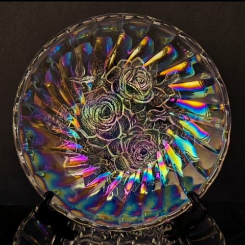 Vintage iridescent glass plate with embossed rose design