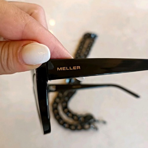 Meller sunglasses with polarized lens and chain, never worn