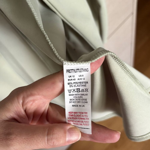 Loose pistachio jacket with brown buttons like new