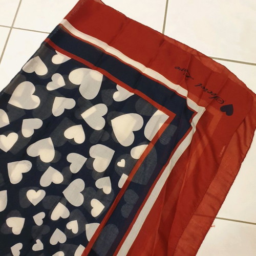 Scarf used with blue and red hearts