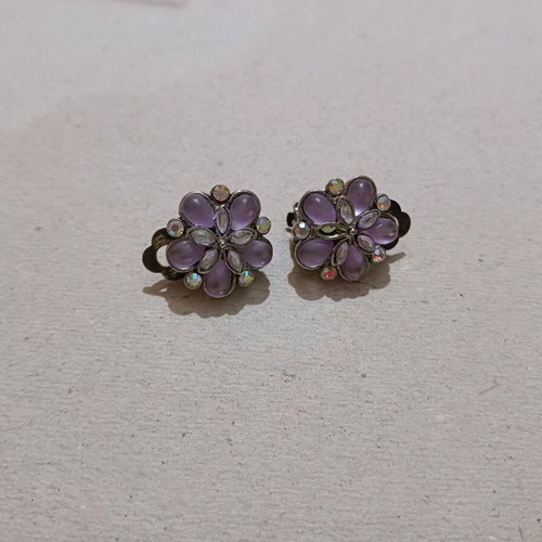 Earrings used with clip missing one rhinestone